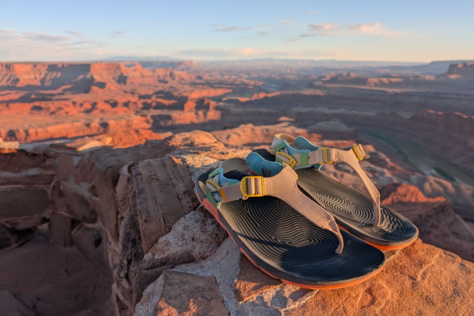 Showing off the textured footbed and comfy knit straps of the Lems Switchback Knit sandals during golden hour.
