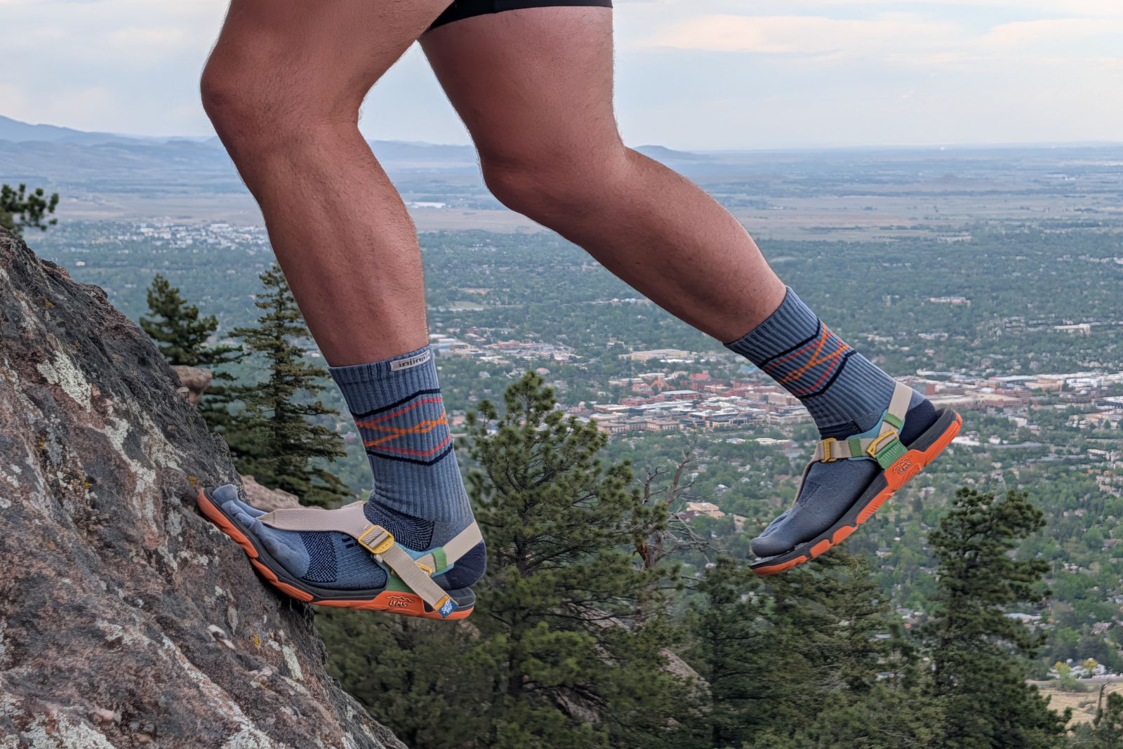 Showing off the grip on a steep pitch of a flatiron scramble in the Lems Switchback Knit sandals.