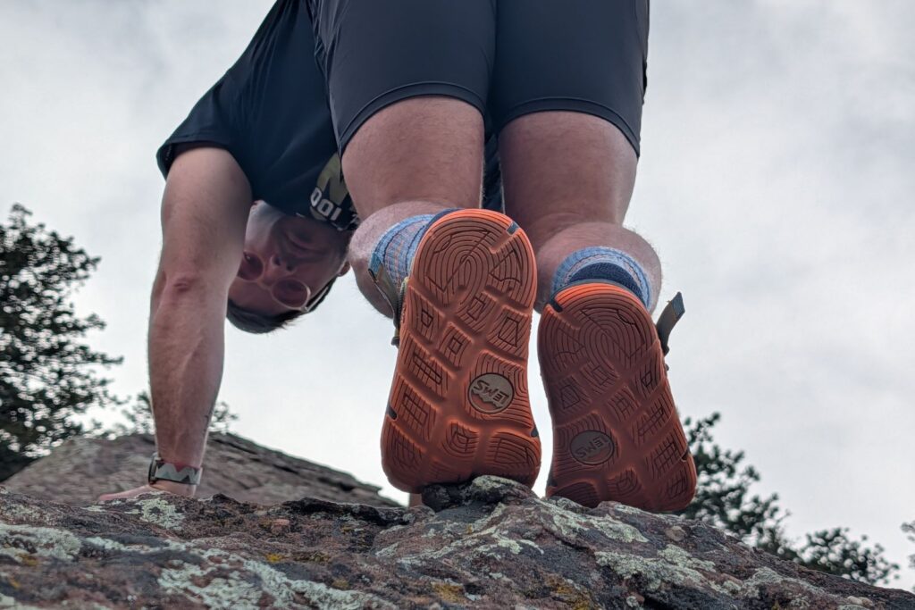 Bottom up shot of the tread of the Lems Switchback Knit sandals on flatiron rock.