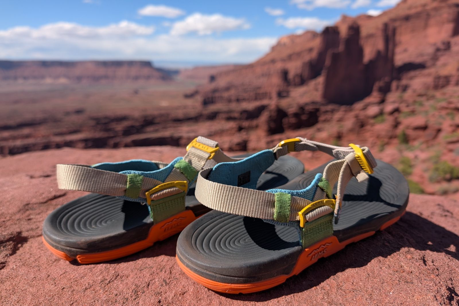 Rear and side display of the Lems Switchback Knit sandals in the Fisher Towers.