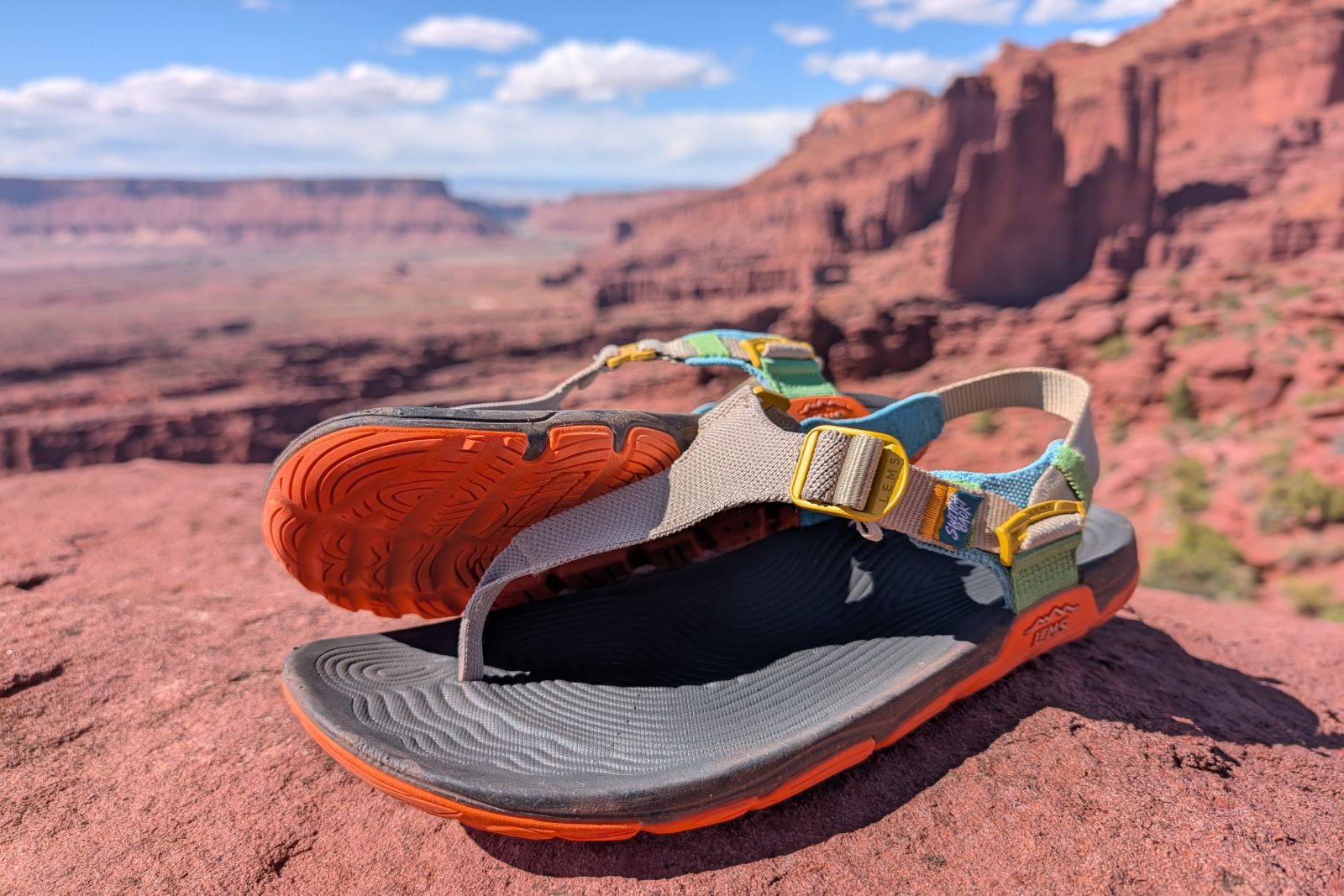 Displaying the footbed and tread simultaneous of the Lems Switchback Knit sandals in the Fisher Towers.
