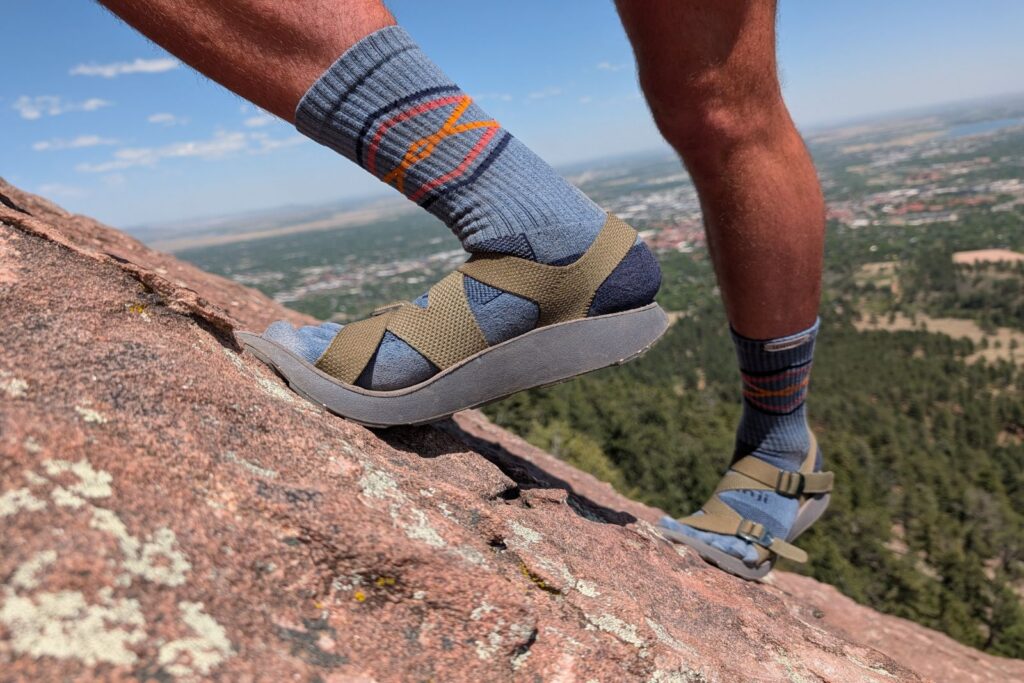 Showing the flexibility and grip of the Tread Lab Redway sandals on flatiron rock.