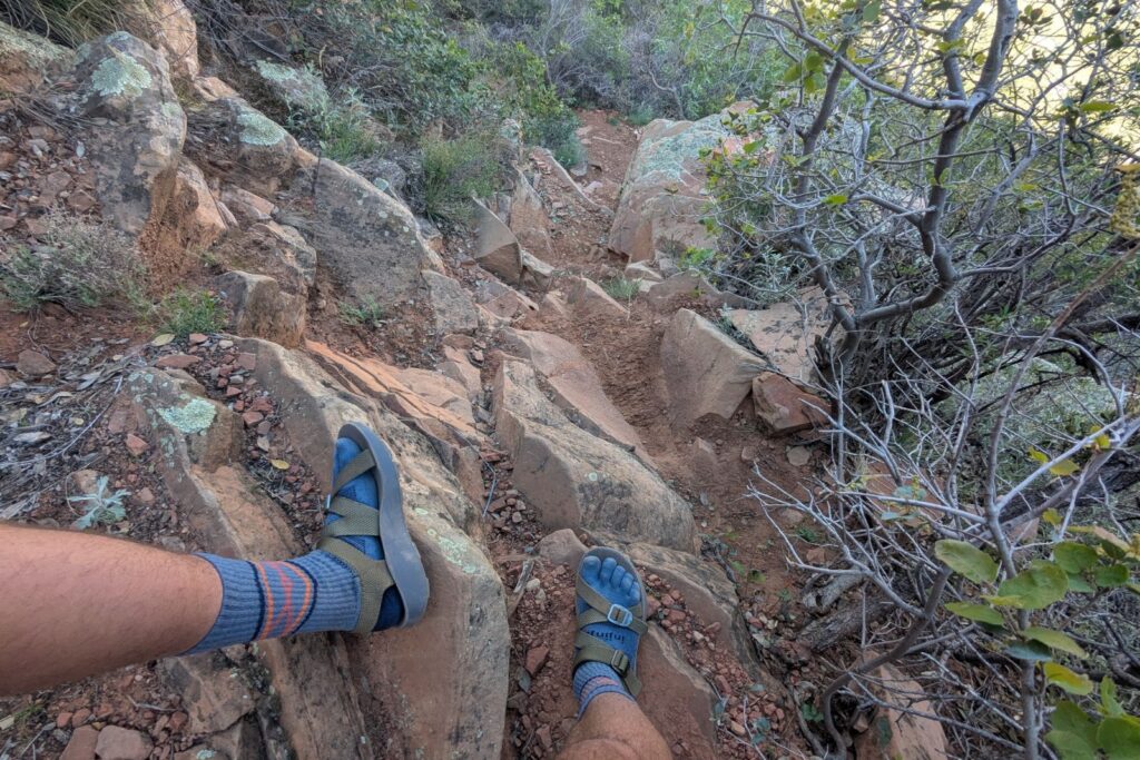 Descending a rocky trail in Sedona in the Tread Lab Redway sandals.