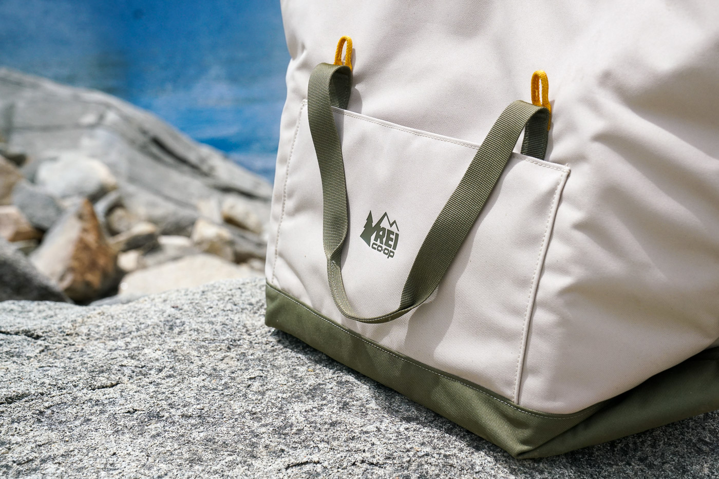 A close up of a pocket on the side of a soft-sided cooler.