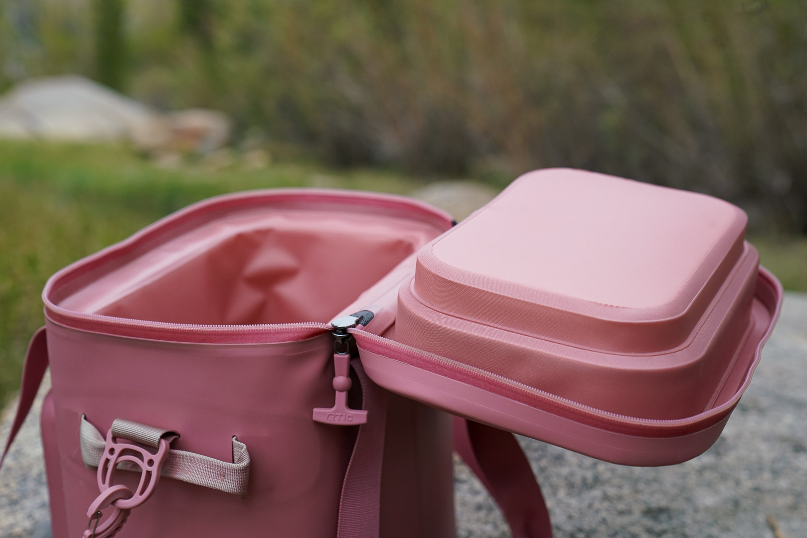 A close up of the open lid of a soft-sided cooler.