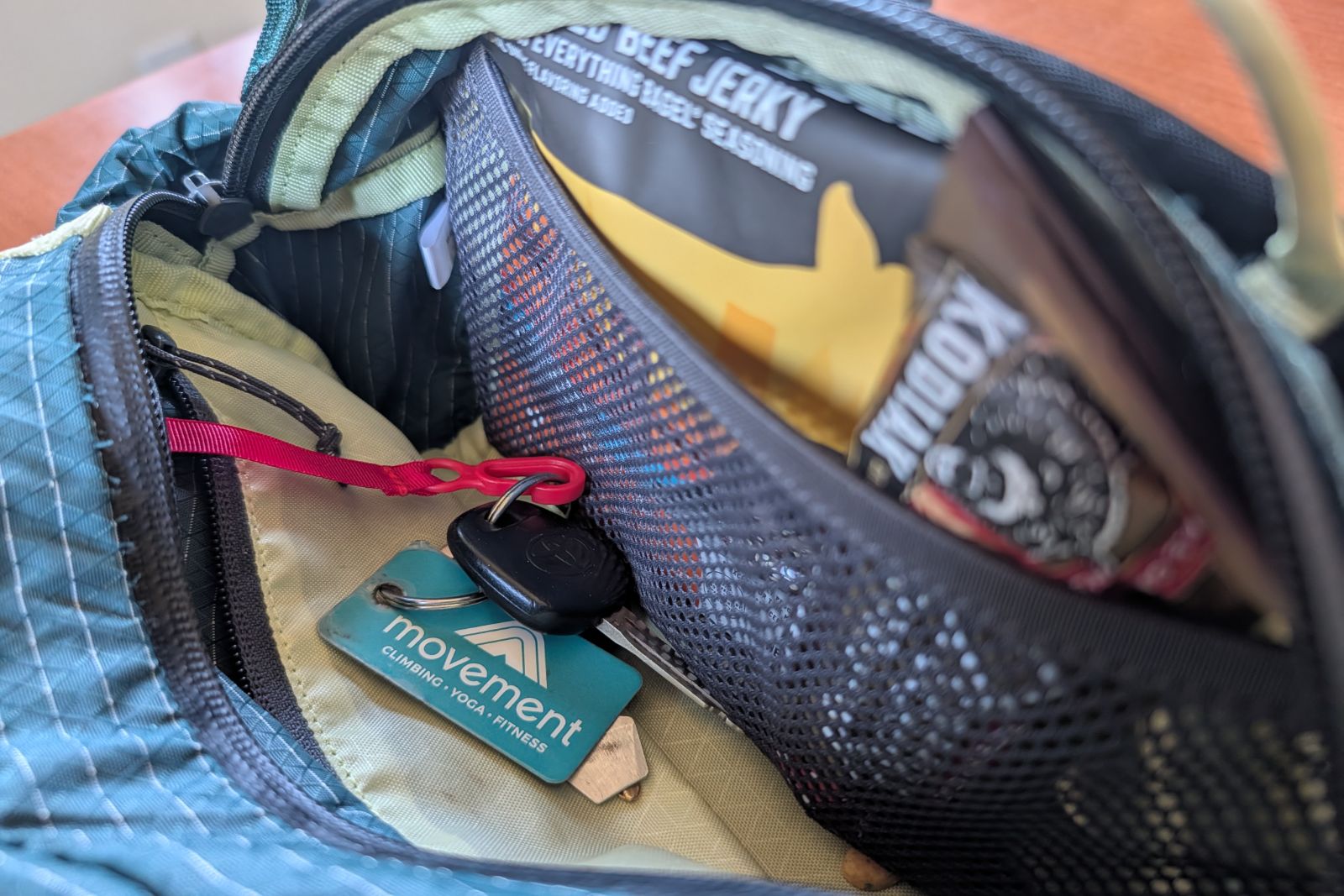 Close-up image showing off the the interior organization of a lumbar pack.